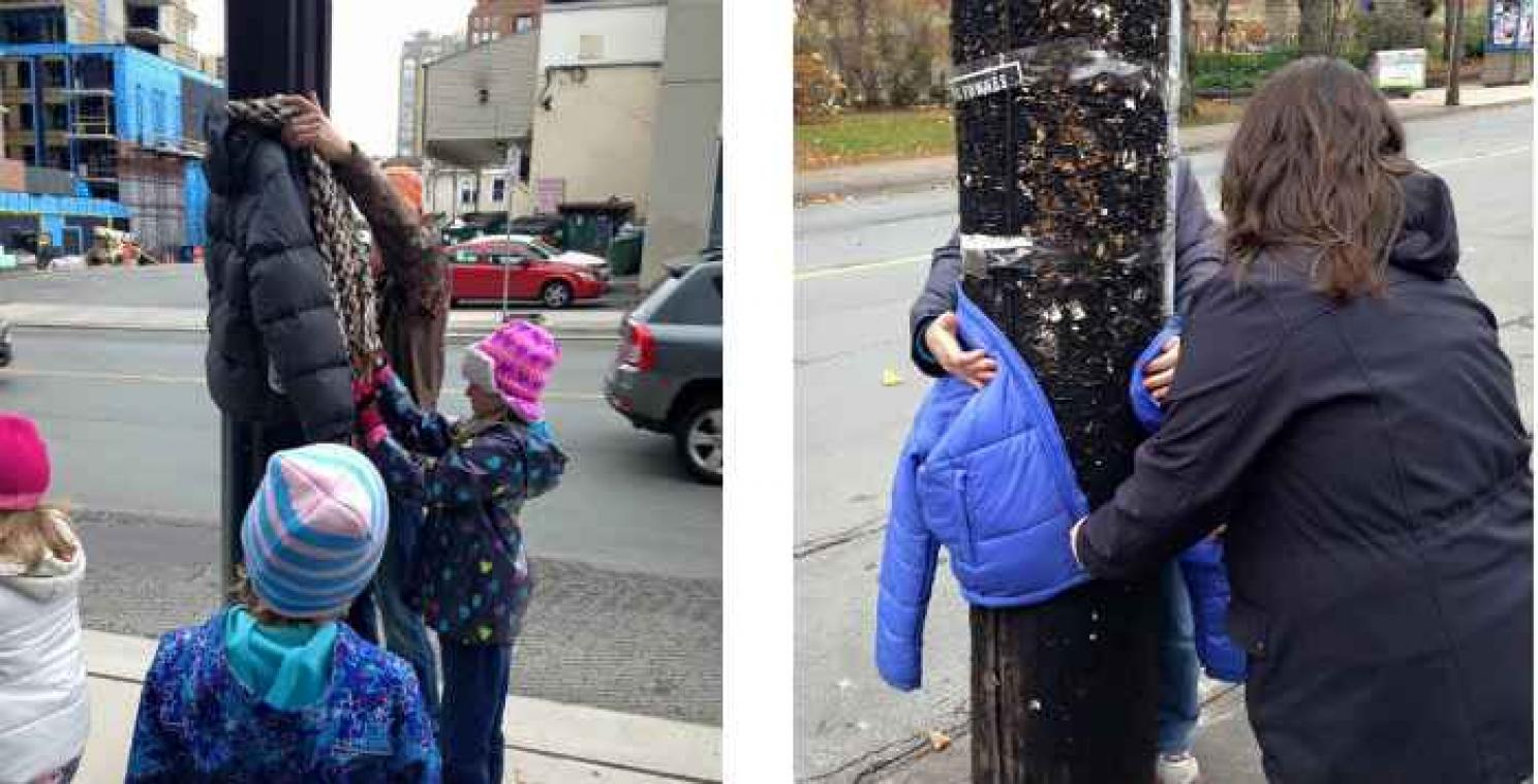 Canada : Des enfants accrochent des manteaux dans la rue pour aider les SDF