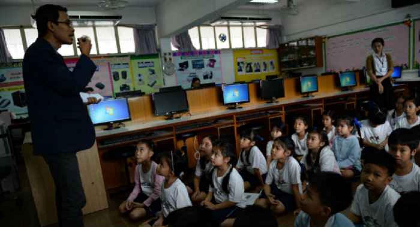 Les écoliers thaïlandais soumis à douze commandements